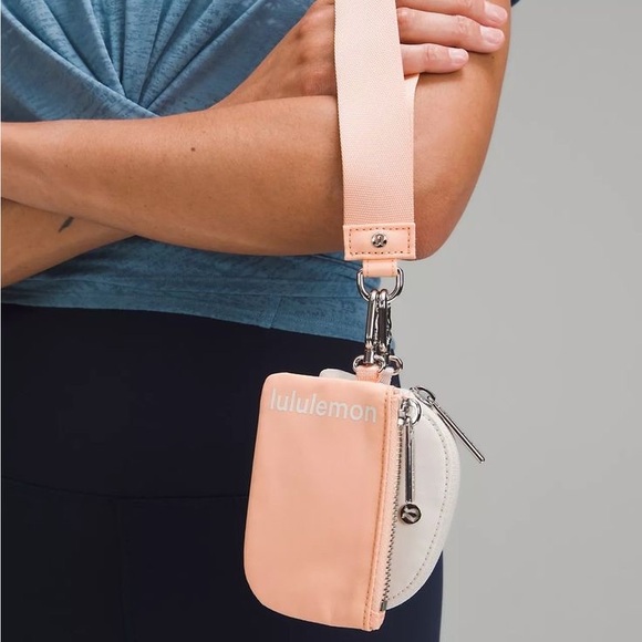 lululemon Handbags - Lululemon athletica Dual Pouch Wristlet coral beige bags nwt gym